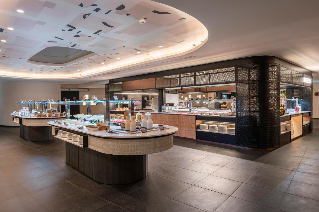 Barcelo Tenerife Golf Del Sur Exterior photo The buffet at the restaurant