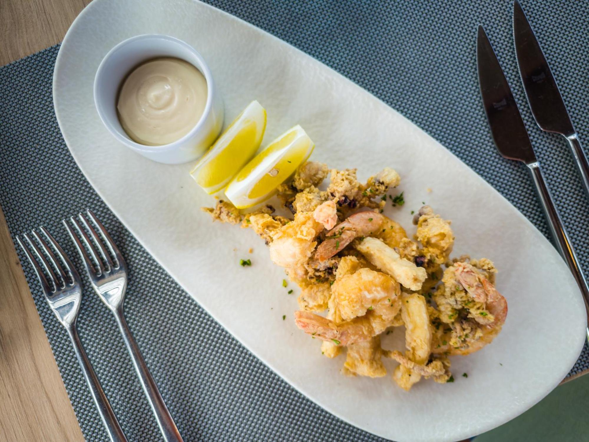 Barcelo Tenerife Golf Del Sur Exterior photo A plate of calamari